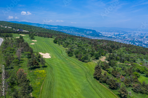 Aerial view of the green golf course in Tbilisi. Georgia. Bird's-eye.