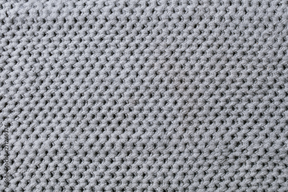 Grey knitted wool texture background pattern with high resolution. Top view. Copy space.