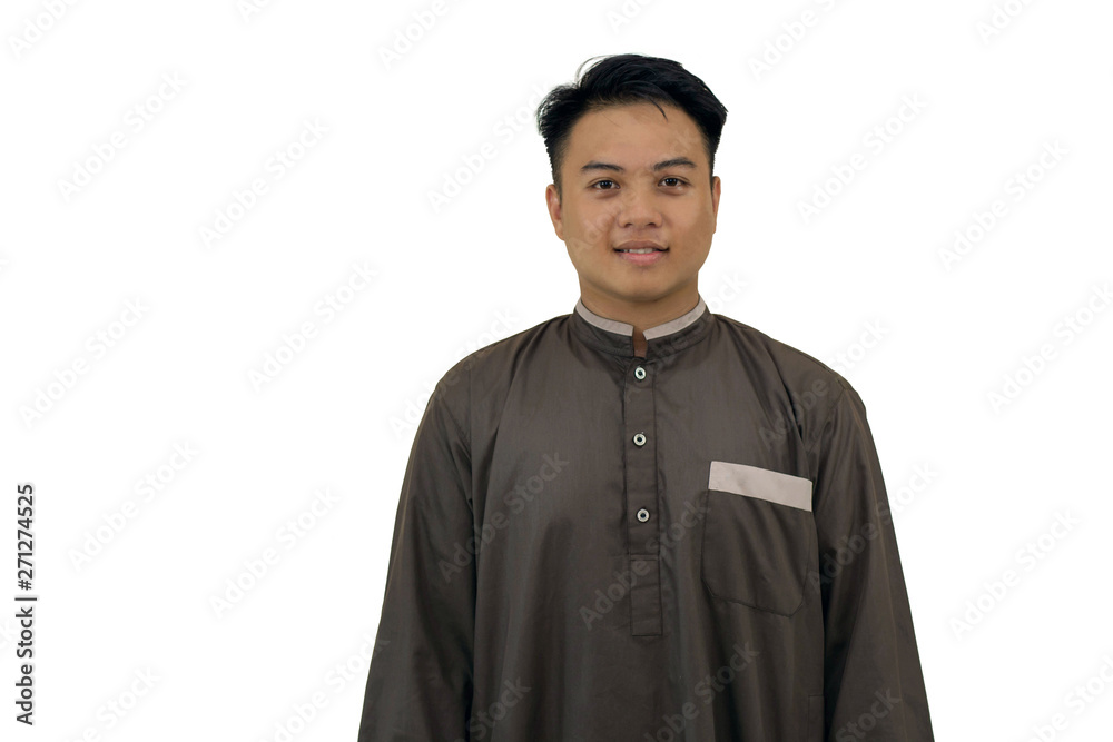 portrait of handsome Muslim youth smiling by posing in front of the camera. portrait of handsome Muslim youth smiling by posing in front of the camera.