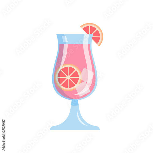 Glass of fresh tasty tropical grapefruit juice with ice cubes