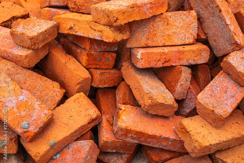 Pile of Red Clay Bricks on the Construction Work Site Floor Pile of Red Clay Bricks on the Construction Work Site Floor