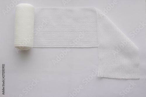 Картината върху платно Roll gauze with fold on white background