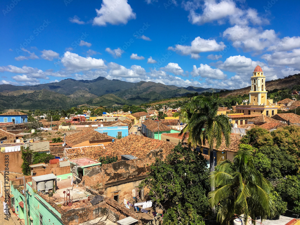 Colorful skyline with mountains and colonial houses. The village is a Unesco World Heritage and major tourist landmark on the Caribbean Island, Trinidad de Cuba
