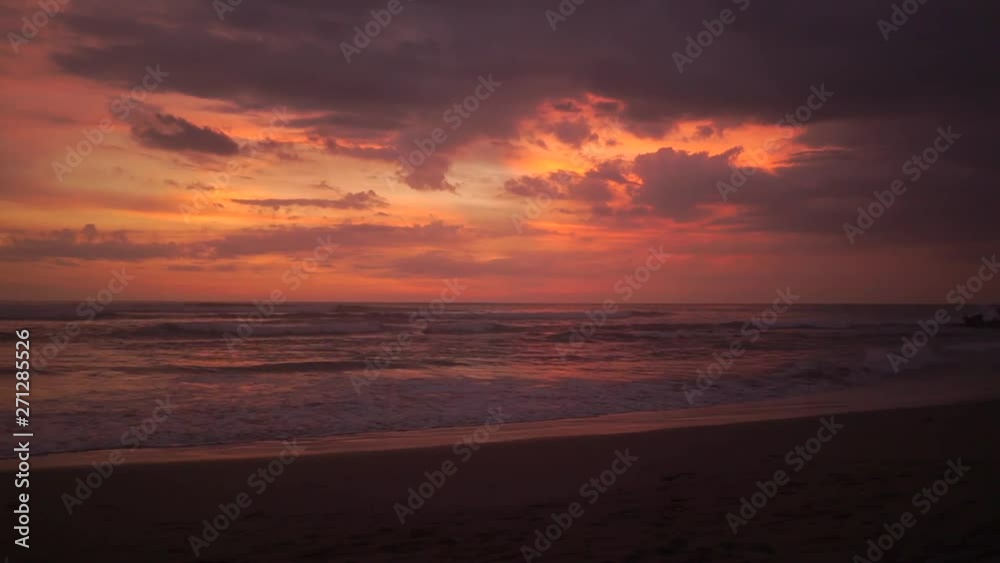Colourful and bright beautiful sunset over the water. Variety of shades of yellow, orange, red and purple. Calming Andaman Sea off the coast of Krabi, Thailand. 50 frames per second full hd footage. Colourful and bright beautiful sunset over the water. Variety of shades of yellow, orange, red and purple. Calming Andaman Sea off the coast of Krabi, Thailand. 50 frames per second full hd footage.