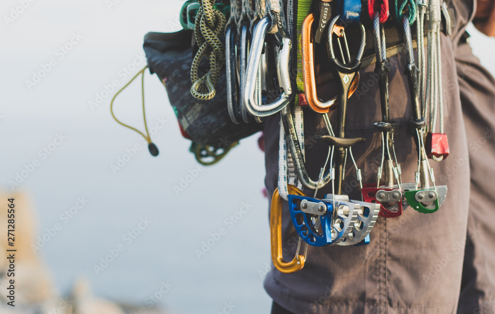 Photo Rock climbing gear attached to harness