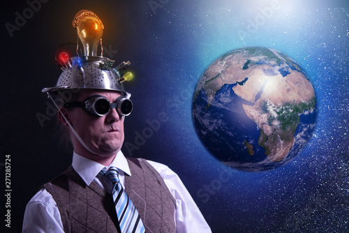 Funny scientist looking to universe and planet earth