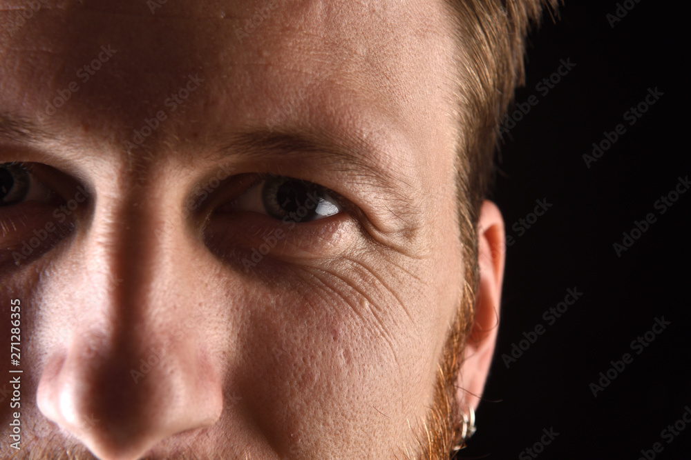 Obraz premium detail of the face of a man in his early thirties