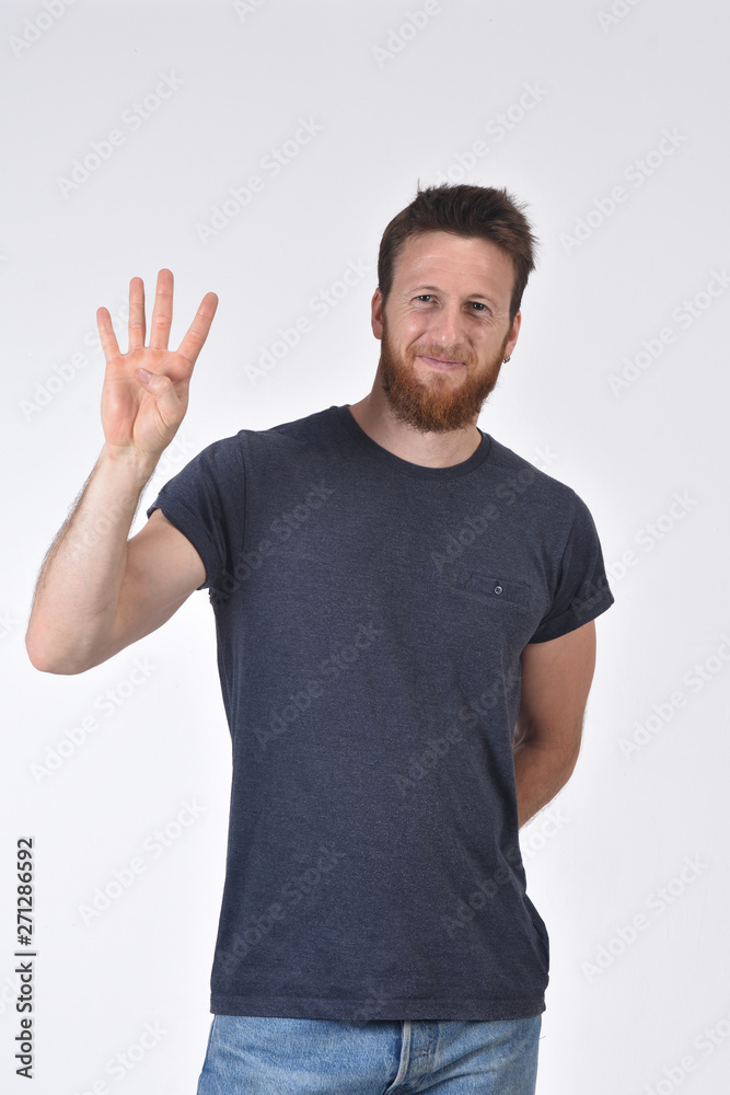 Man with finger in the shape of number four Man with finger in the shape of number four
