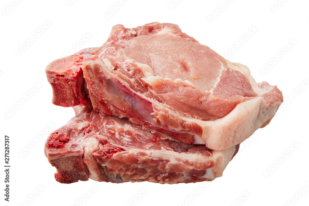 Raw pork loin isolated on white background. Raw fresh pork fillet steak with the bone. Sliced raw pork meat isolated. 