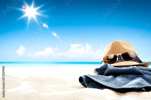 Summer towel on beach and ocean landscape. Free space for your decoration and sun light 