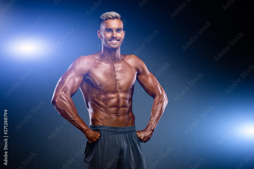 Fototapeta premium Fit, Muscular Young Men Flexing Muscles