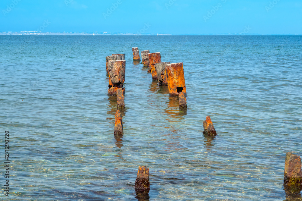 Seascape with Iron pillars that are abandoned in the Black sea