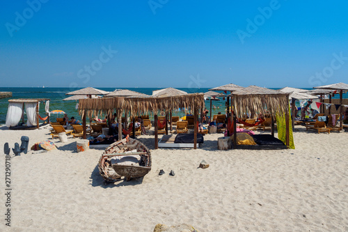 Obraz na płótnie Vintage sun loungers with canopy on beach in Odessa, Ukraine w salonie
