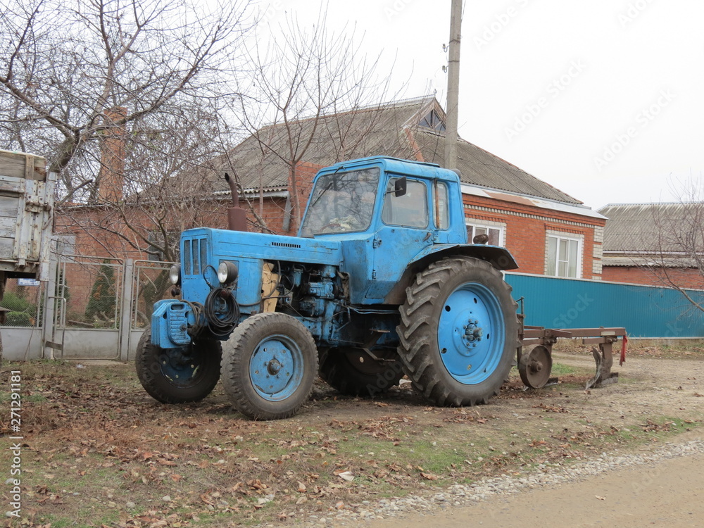 Fototapeta premium Tractor with plough
