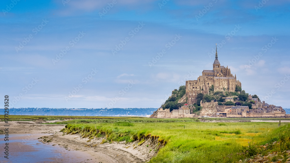 Panoramic view of Le Mont Saint Michel castle on the cliffs, best touristic travel destination in Normandy, France, Europe