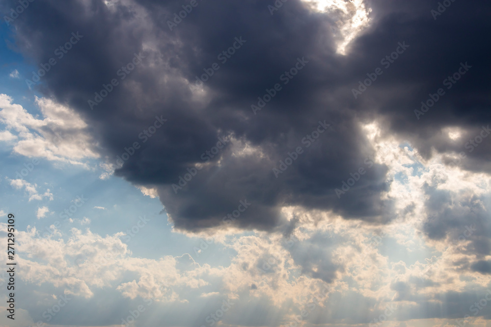 Cumulus clouds, dramatic sky.