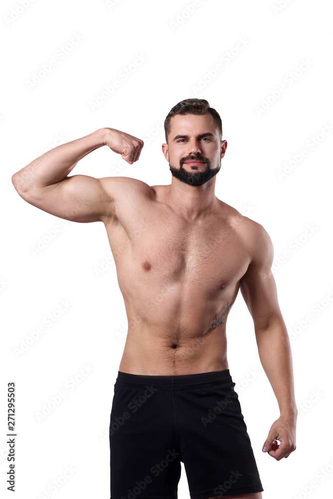 Muscular man shows his arm. Sportsman with spot body on isolated background. Sport concept Muscular man shows his arm. Sportsman with spot body on isolated background. Sport concept