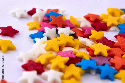 Colorful bright background, multi-colored stars. Sweet nice background candy.