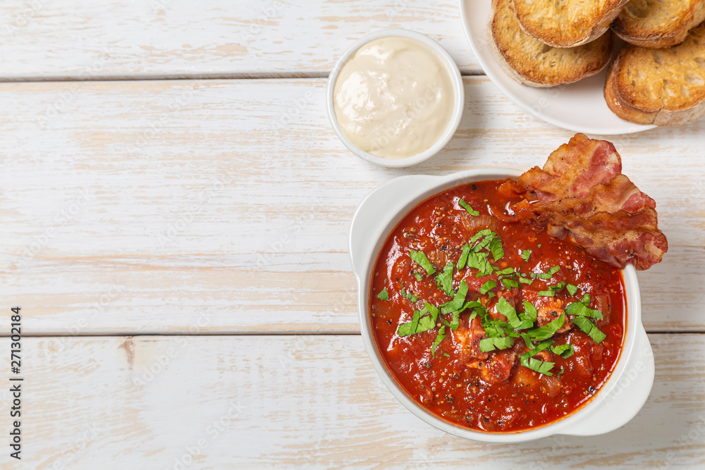 Tomato soup with bacon. The view from the top. Copy-space. Tomato soup with bacon. The view from the top. Copy-space.