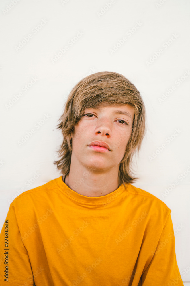 Young boy blond with yellow t-shirt Young boy blond with yellow t-shirt