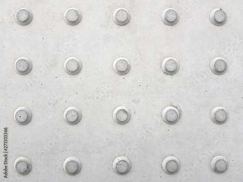 Tactile paving. Dot sign on the floor for blind people. White abstract background