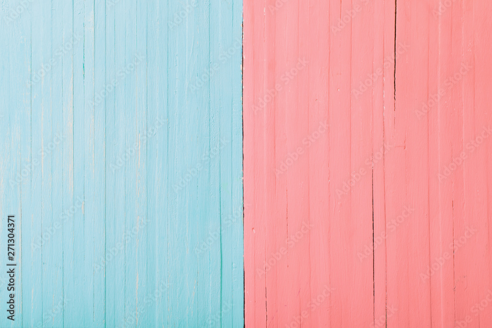 Pink and blue wooden background. Man and woman concept Pink and blue wooden background. Man and woman concept