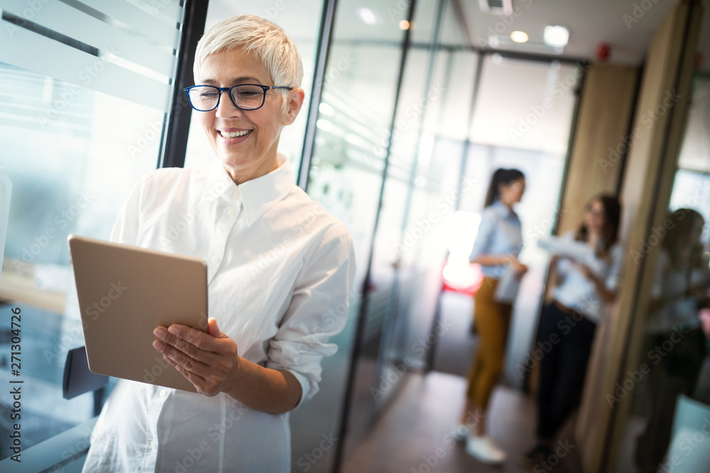 Pretty senior business woman, successful confidence in financial building Pretty senior business woman, successful confidence in financial building