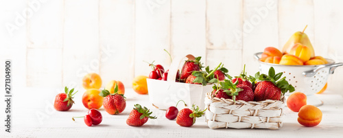 Still life with various types of fresh fruits and berries