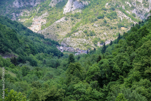 View from afar on medieval village in the Pyrenees mountains.