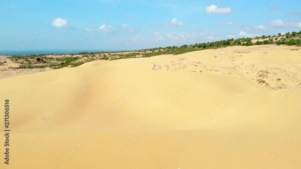 Mui Ne white sand dunes, Vietnam. Aerial drone shot, sunny day. Mui Ne white sand dunes, Vietnam. Aerial drone shot, sunny day.
