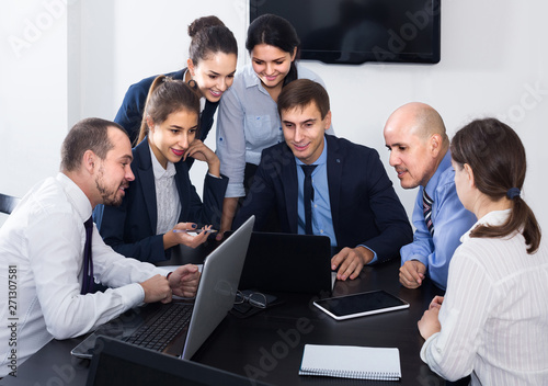 Team discussing business project during coffee break