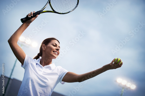 Happy fit girl playing tennis together. Sport concept