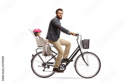 Bearded man riding a little child on a bicycle and looking at the camera