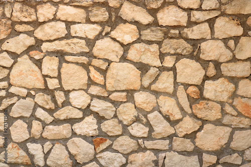 Obraz premium Big yellow wall from stone bricks