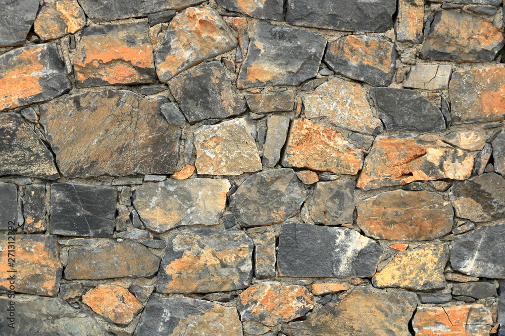 Big gray wall from stone bricks