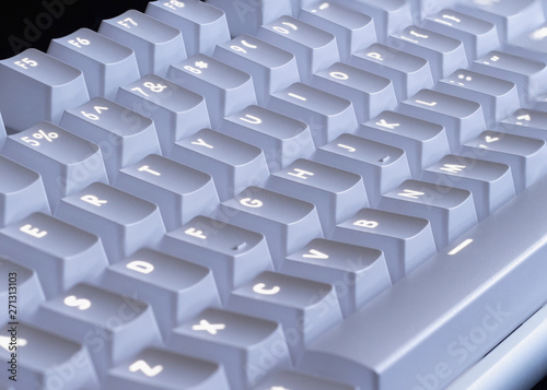 white LED glowing mechanical keyboard - close up