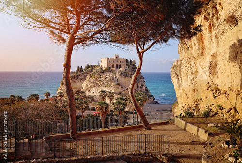 Fototapeta Naklejka Na Ścianę i Meble -  beautiful italian town Tropea, in south of Italy with the iconic beach, old town and church at the cliff. Sunset