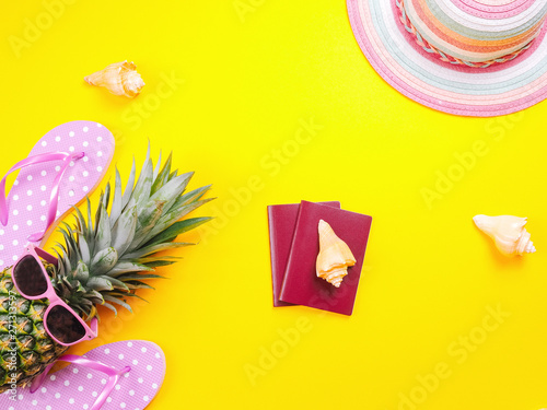 Pineapple wearing sunglasses on a yellow background