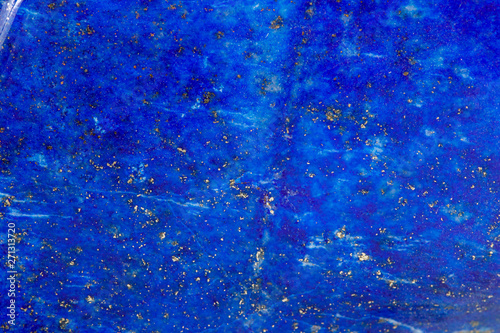 Macro of a mineral stone Lazurite on a white background
