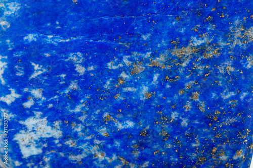 Foto Macro of a mineral stone Lazurite on a white background
