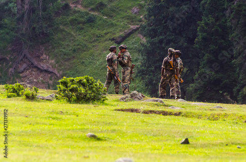 Kashmir, India - August 4th: Indian soldiers along the kashmir border conflict zone photo