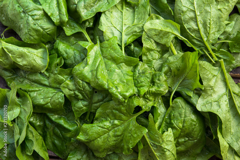 Leaves of green spinach close-up. A bunch of fresh spinach Leaves of green spinach close-up. A bunch of fresh spinach