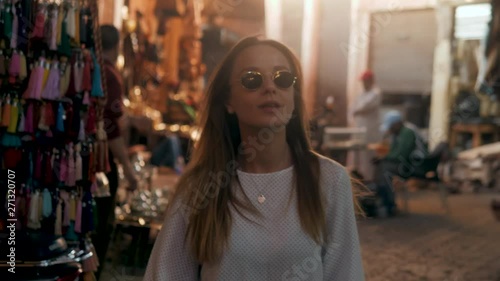 Wallpaper Mural Happy beautiful tourist woman in fashionable summer dress enjoying in MARRAKECH evening Marocco arabian market, traditional old arabic place Torontodigital.ca