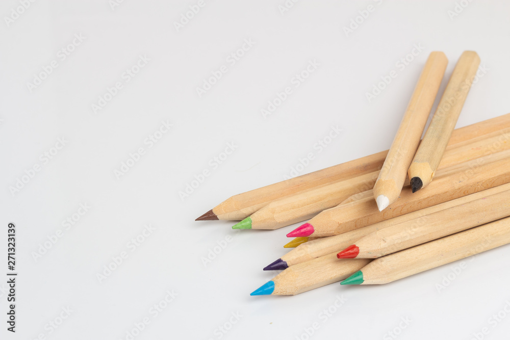 Colored pencils lies on a white background Colored pencils lies on a white background