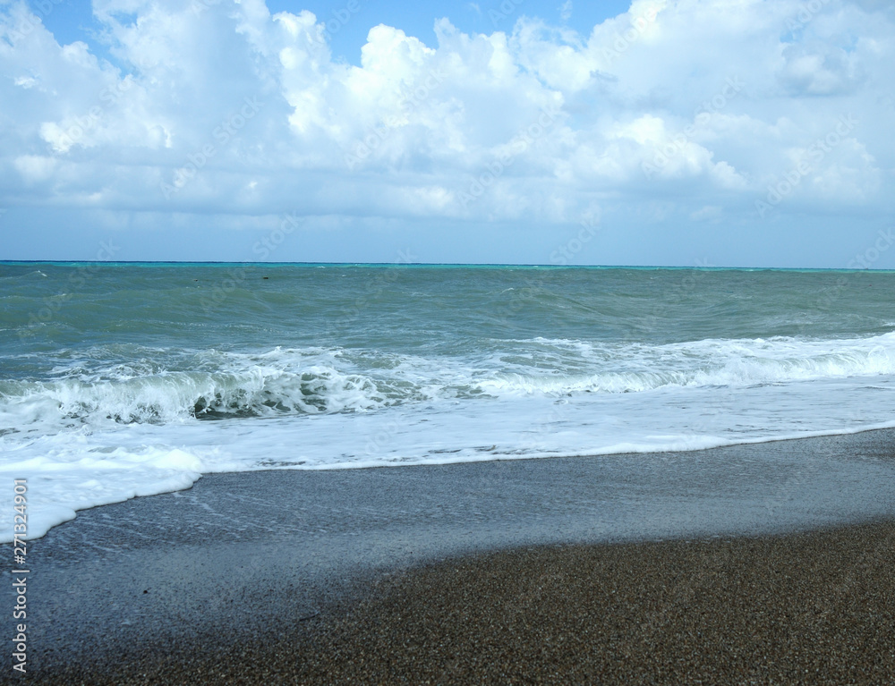 waves crashing on the beach