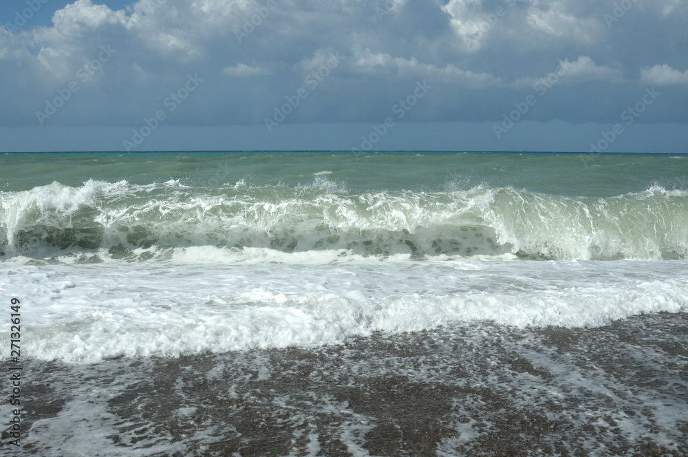 waves crashing on the beach