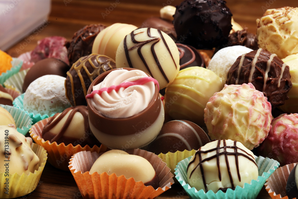 a lot of variety chocolate pralines, belgian confectionery gourmet chocolate praline.