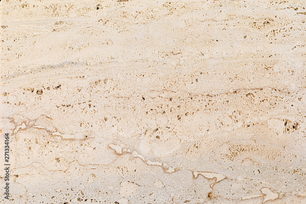 Closeup of beige porous stone textured wall. Neutral beige nature background for design and skins. - obrazy, fototapety, plakaty 