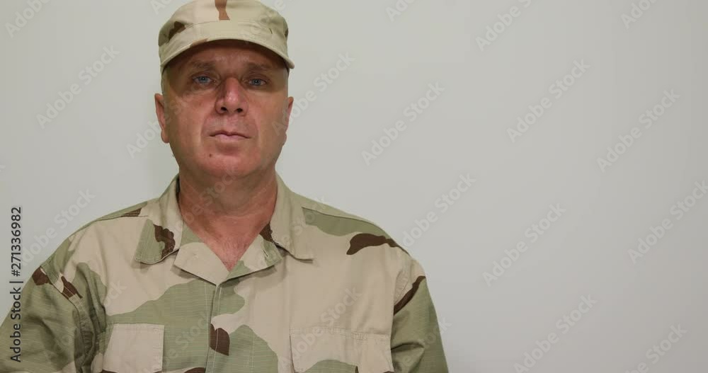 Portrait of Confident Soldier Staying Still in a Military Position