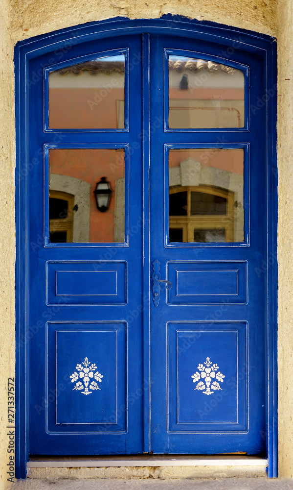 close up retro style old house door of Mediterranean architectural culture in Alacati town of Izmir, Turkey